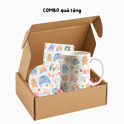 Ly sứ gấu nhỏ ôm hoa