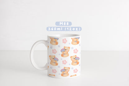 Ly sứ gấu nhỏ ôm hoa