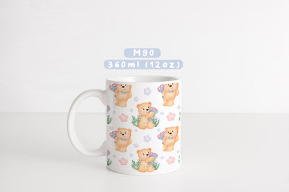 Ly sứ gấu nhỏ ôm hoa